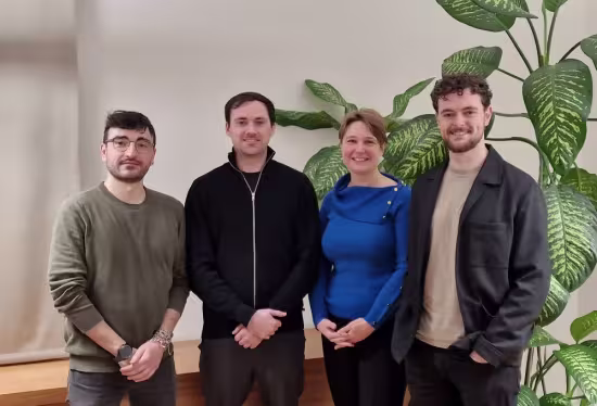 syntropic founders team in front of white background and plants